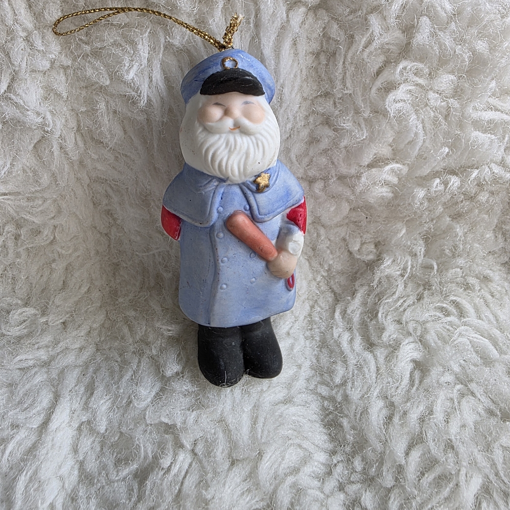 Santa Claus Holiday Police Ornament in Blue and Red.